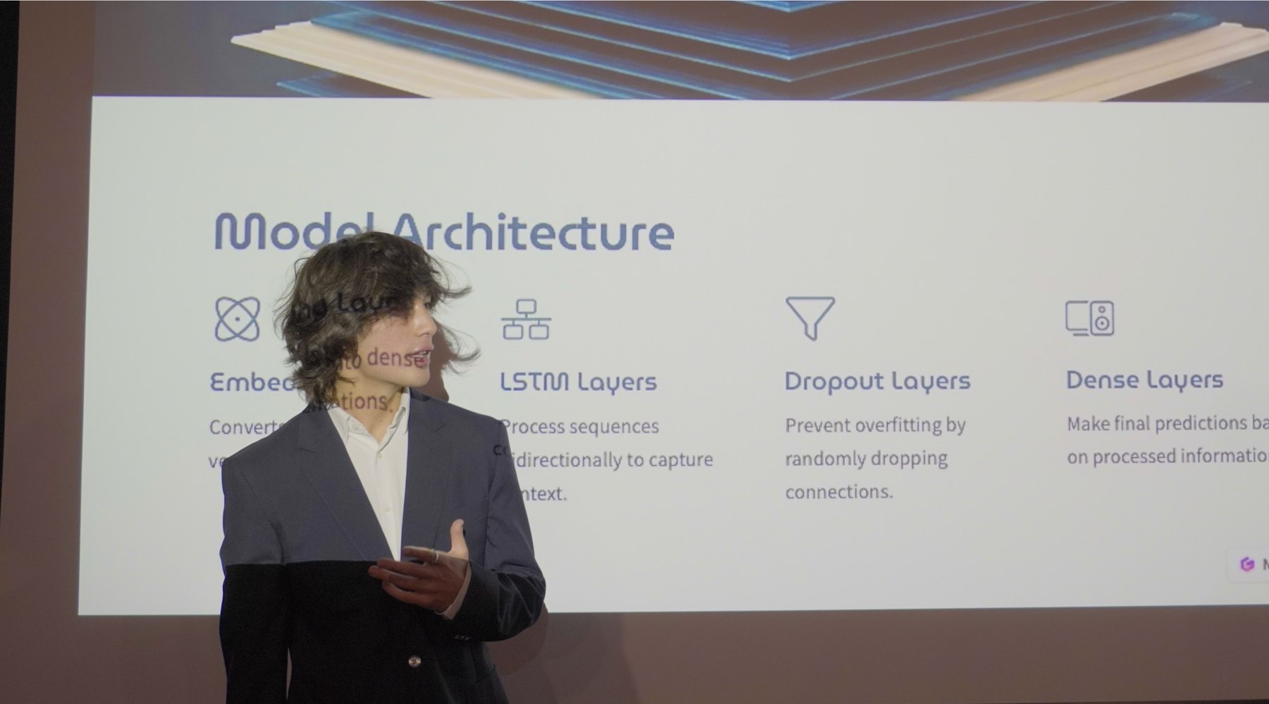 Desmond Kao presenting a talk on model architecture